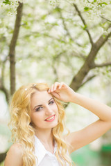 Spring portrait of a beautiful young blonde