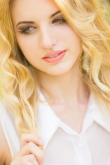 Spring portrait of a beautiful young blonde