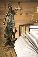 Lady of justice, Wooden & gold gavel and books on table - 64194759