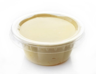 Mayonnaise in a plastic bowl