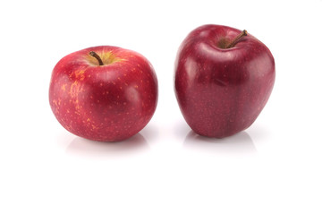 Two red apples isolated on white background