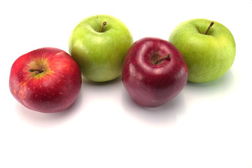 Red and green apples isolated on white background