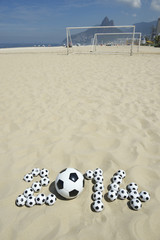 Obraz premium Soccer 2014 Message on Brazil Beach