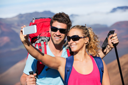 Couple Taking a Photo of Themselves with Phone