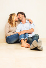 Happy young couple at home