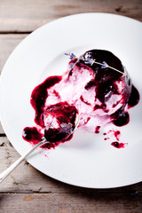 Berry ice cream on a white plate