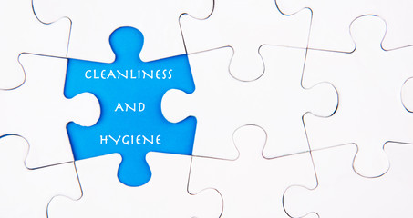 Fototapeta premium Missing puzzle revealing the CLEANLINESS AND HYGIENE words