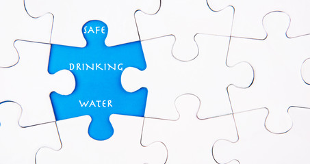 Missing  puzzle revealing the SAFE DRINKING WATER words