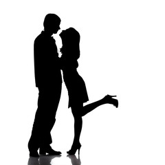 Silhouette of couple in love, kiss moment.
