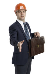 success businessman holding briefcase and handshake