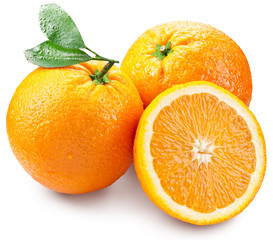 Oranges with slice and leaves isolated on a white background.