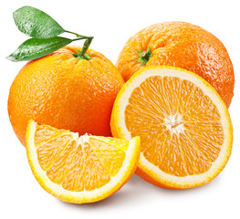 Oranges with slice and leaves isolated on a white background.