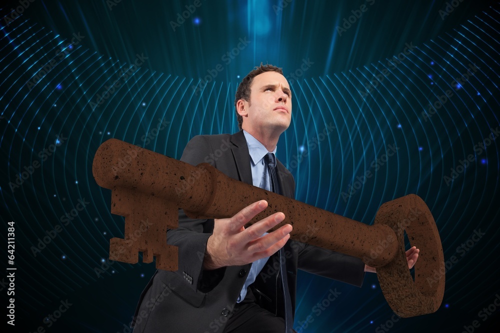 Poster composite image of businessman carrying large key
