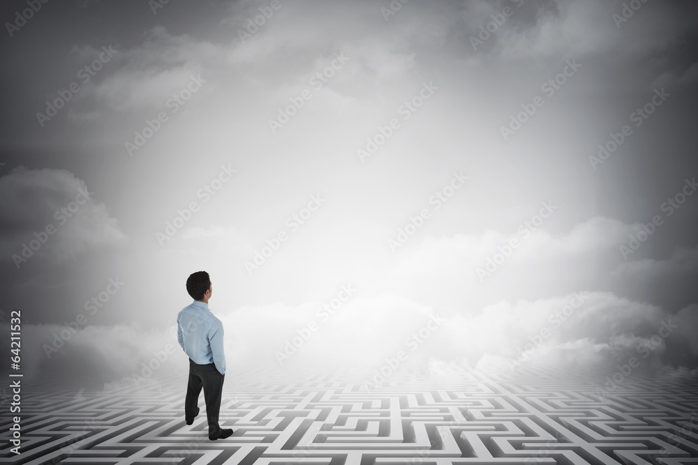 Poster composite image of businessman standing with hands in pockets