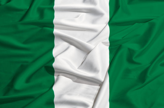 Nigeria flag on a silk drape