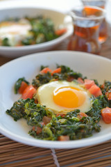 Fried eggs with spinach