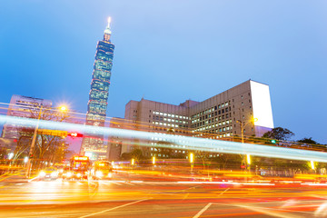 Fototapeta premium Car light trails and urban landscape in modern city