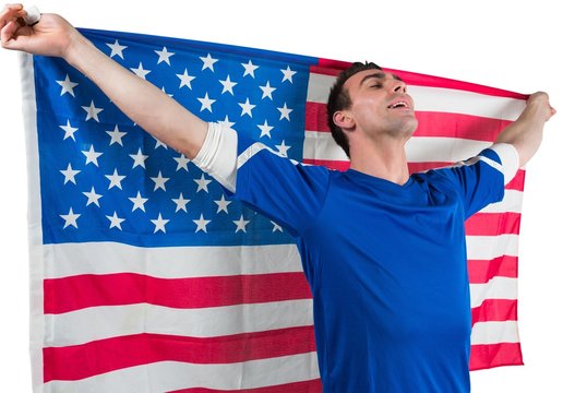 American soccer fan holding flag