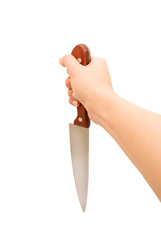 Woman hand with kitchen knife