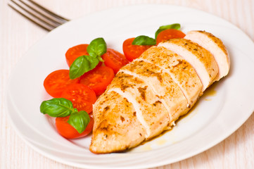 chicken breast with fresh cherry tomatoes