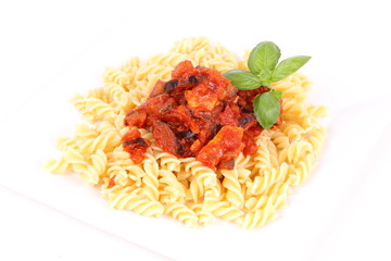 Fusilli pasta with pork & eggplant sauce, on a fork, on a white background