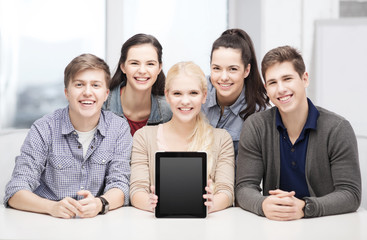 smiling students with blank tablet pc screen