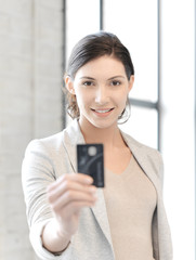 happy woman with credit card