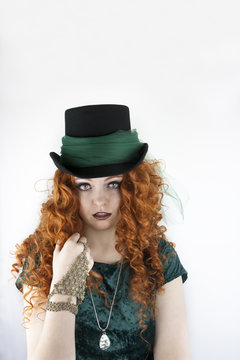 Irish girl wearing green velvet dress and top hat