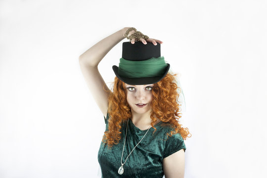 Pretty young Irish woman wearing a hat