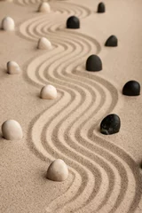 Fotobehang Zen Stenen  line  made of  stones standing on the sand  © alekleks