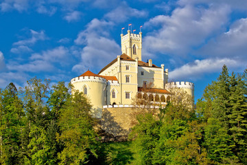 Fototapeta premium Colorful castle on green hill