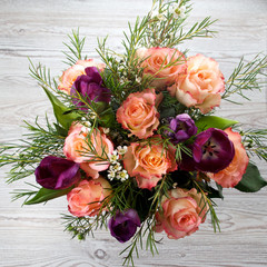 bouquet of flowers on wooden background