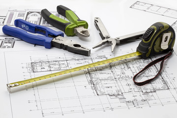 Tools lying on blueprint