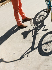 girl, bicycle and shadow