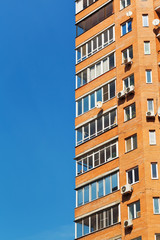 blue sky and wall of apartment house