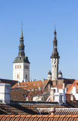 Fototapeta premium Towers of St. Nicholas church and Town Hall in Tallinn, Estonia