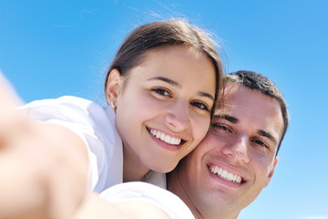 Fototapeta premium happy couple have fun on the beach