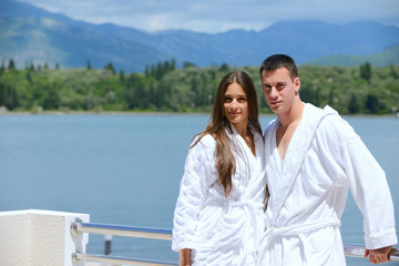 young couple on yacht