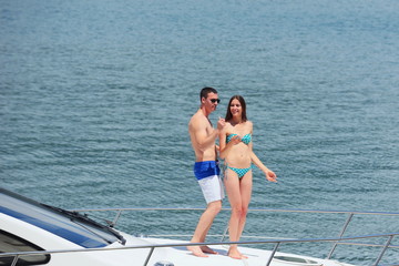 Fototapeta premium young couple on yacht