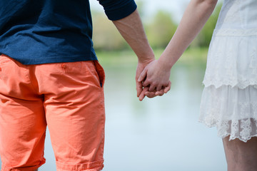 cheerful young couple on holiday sightseeing and visiting