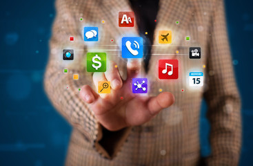 Businessman pressing various collection of buttons