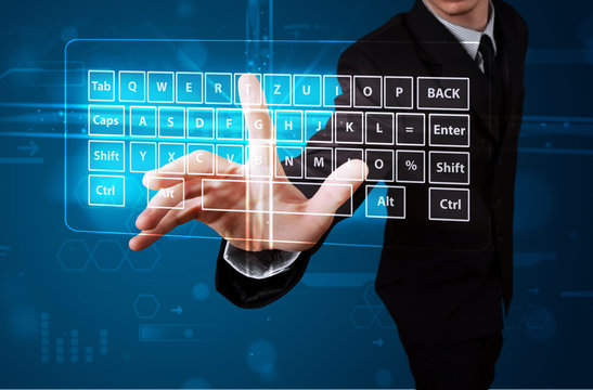 Businessman pressing virtual type of keyboard