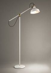 Fototapeta na wymiar White floor lamp on grey background