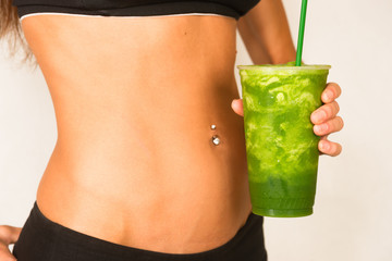 Slender Female Torso Tanned Toned Body Blended Fruit Smoothie