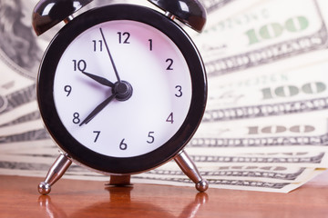 Alarm Clock and Banknotes