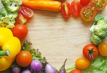 Healthy Organic Vegetables on a Wooden Background. Frame Design