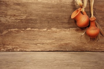 Old Clay Jugs Girland in Grunge wood background, XXXL