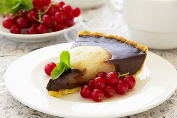 Chocolate tart with pears. Selective focus.