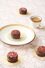 Obraz na płótnie Canvas Chocorons - Macarons glazed in chocolate