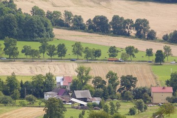 summer rural landscape with a field and hay